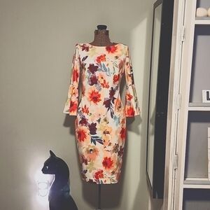 Calvin Klein fitted dress. Has liner. Thick material. Sz 4  floral design